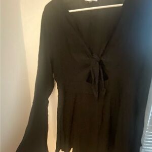 Pink Lily Black Gauzy Romper Size Medium Perfect for your next vacation!